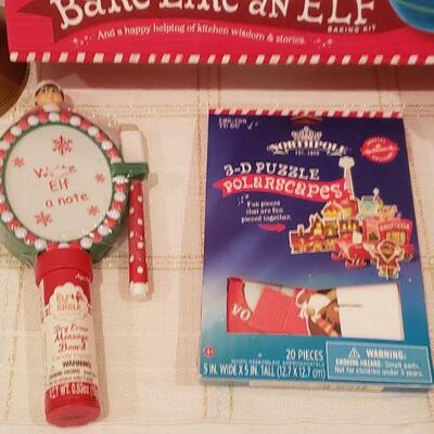 Lot 816: New Bake Like An Elf Set, Cookie Wonder Wheel, Elf Notes, 3D Puzzle, and Interactive Animated  Bell