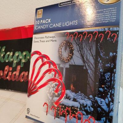 Lot 825: HAPPY HOLIDAYS Lit Sign + Candy Cane lights