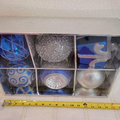 Lot 826: Assorted Christmas Ornaments + Hallmark Talking Snowman 