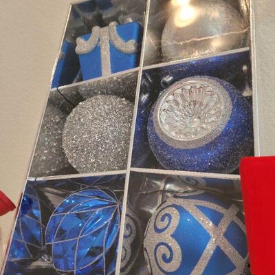 Lot 826: Assorted Christmas Ornaments + Hallmark Talking Snowman 