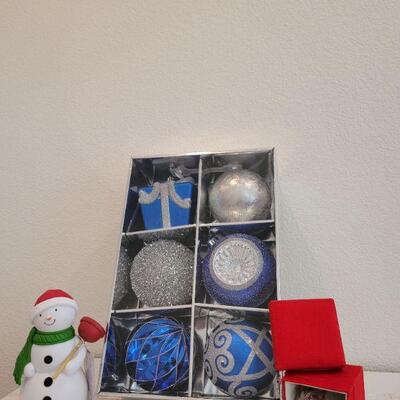 Lot 826: Assorted Christmas Ornaments + Hallmark Talking Snowman 