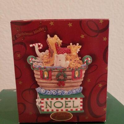 Lot 839: Musical Water Fountain and Noah's Arkansas Christmas Deco