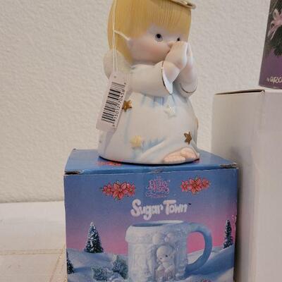 Lot 840: Assorted Precious Moments Christmas Deco
