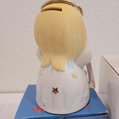 Lot 840: Assorted Precious Moments Christmas Deco