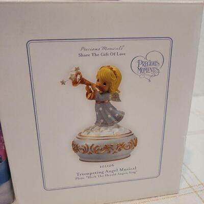 Lot 840: Assorted Precious Moments Christmas Deco