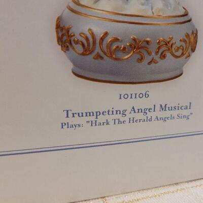 Lot 840: Assorted Precious Moments Christmas Deco