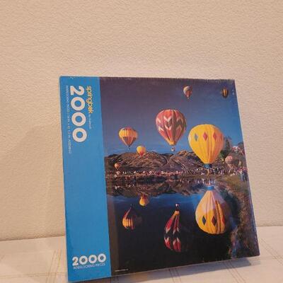 Lot 845: Vintage NEW Springbok 2000 piece Puzzle HOT AIR BALLOONS