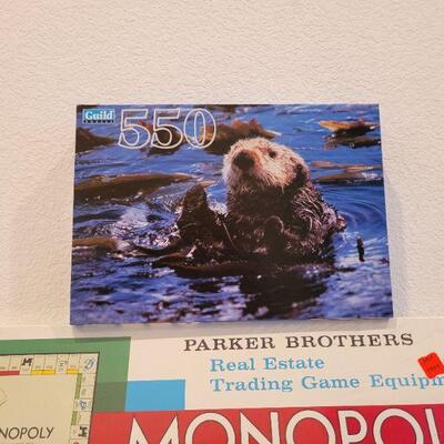 Lot 852: Vintage NEW Monopoly Board Game + Otter 550 piece Puzzle New