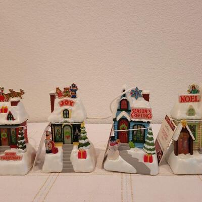 Lot 854: (4) Hallmark Synchronized Christmas Houses TESTED A+