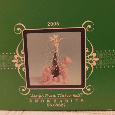 Lot 864: Assorted Dept 56 Snowbabies Christmas Figures and MORE