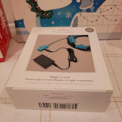 Lot 880: Hallmark Magic Cord Ornaments w/ Magic Cord