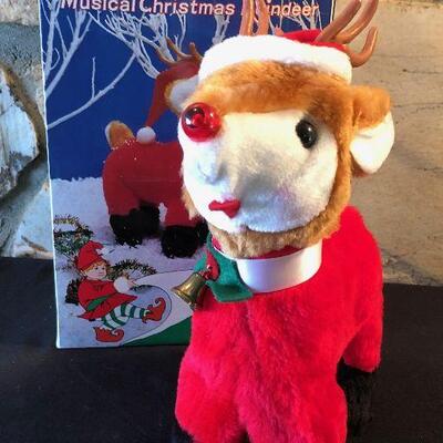 #742 Flashing Nose Reindeer  Musical Battery operated 