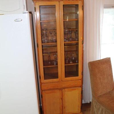Oak glass fronted cabinet, 76