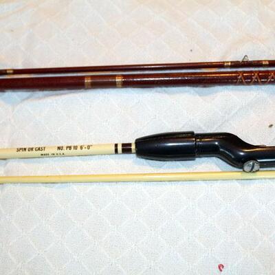 two fiberglass fishing poles, 1 Shakespeare, one unsigned (#141)