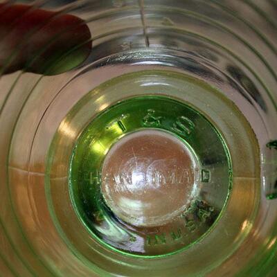 Vintage green measuring cup with fitted mixer (#187)