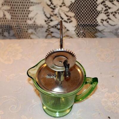 Vintage green measuring cup with fitted mixer (#187)