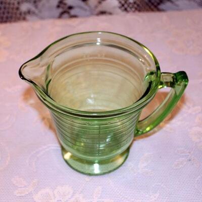 Vintage green measuring cup with fitted mixer (#187)