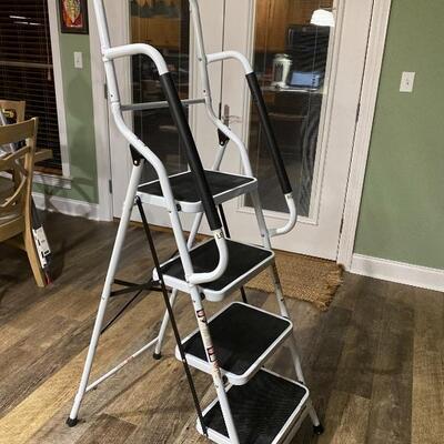 4 Step Foldable Ladder with top handles -like new 