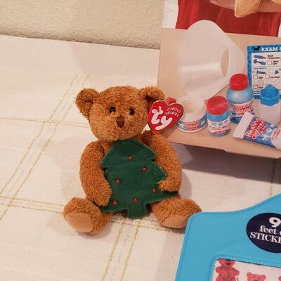 Lot 891: New Melissa & Doug Pet Vet Play Set, Stickers and Soft Ty Beanie Baby Ornament 
