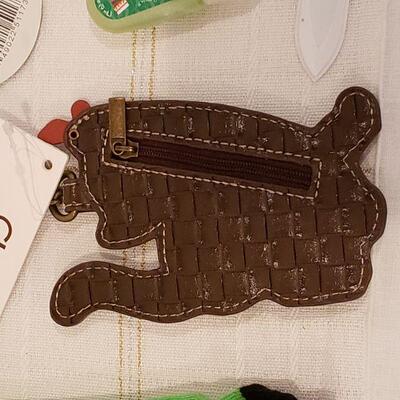 Lot 893: New Chala Cat Coin Purse, Manicure Set, Lip Gloss and Socks