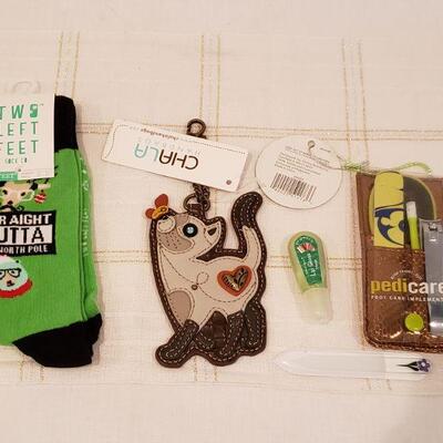 Lot 893: New Chala Cat Coin Purse, Manicure Set, Lip Gloss and Socks