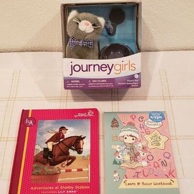 Lot 899: NEW Journey Girls Cat Set, Our Generation Book and Precious Moments Activity Pad