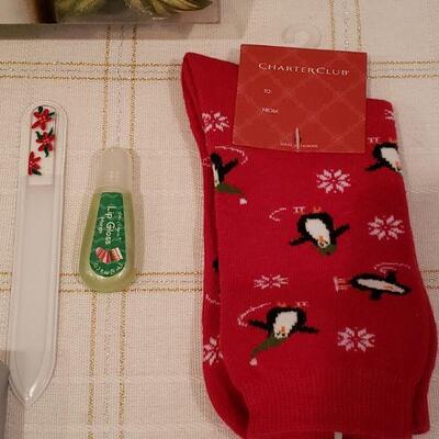 Lot 900: NEW Ornament, Manicure Set, Angel Brooch, Holiday Socks, Lip Gloss, Coin Purse and Yankee Candle Potpourri 