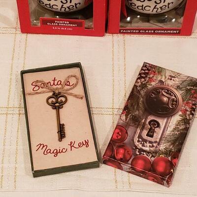 Lot 901: NEW Santa's Magic Key, (2) Best Teachers Ornaments and a Merry Christmas Ornament 