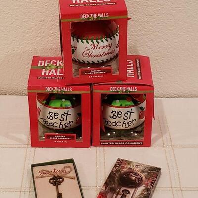 Lot 901: NEW Santa's Magic Key, (2) Best Teachers Ornaments and a Merry Christmas Ornament 