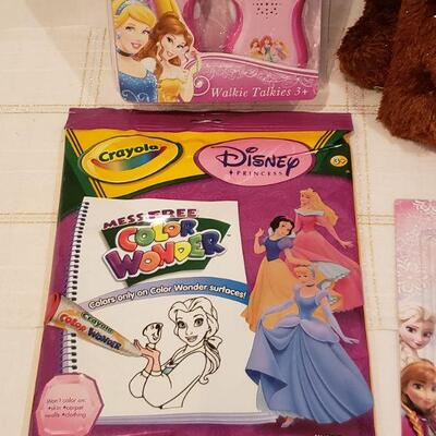 Lot 902: New Disney Princess Walkie-talkie Set, Disney Activity Pad, Pencils and Hallmark "Comet" Reindeer Plushie 