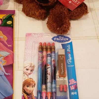 Lot 902: New Disney Princess Walkie-talkie Set, Disney Activity Pad, Pencils and Hallmark "Comet" Reindeer Plushie 