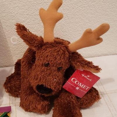 Lot 902: New Disney Princess Walkie-talkie Set, Disney Activity Pad, Pencils and Hallmark "Comet" Reindeer Plushie 