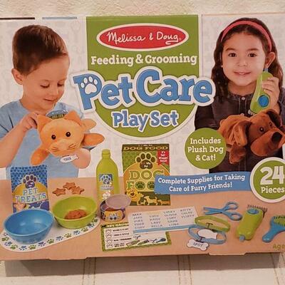Lot 905: NEW Melissa & Doug Pet Care Play Set, Rainbow Jax and Small Plushie Cat