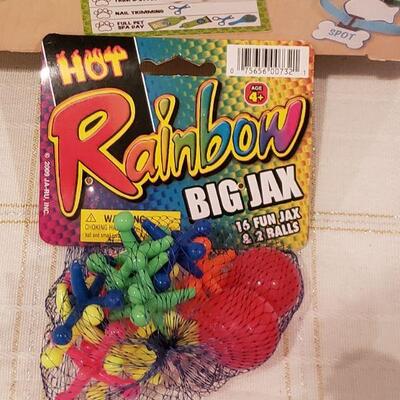 Lot 905: NEW Melissa & Doug Pet Care Play Set, Rainbow Jax and Small Plushie Cat