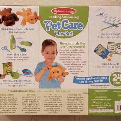 Lot 905: NEW Melissa & Doug Pet Care Play Set, Rainbow Jax and Small Plushie Cat