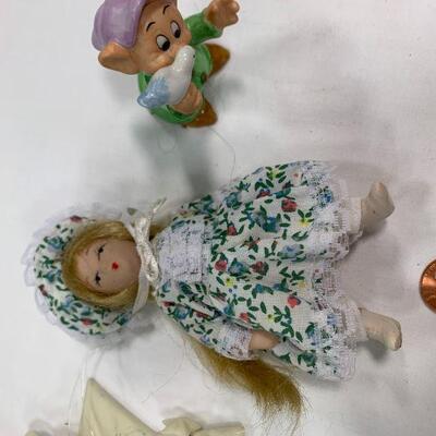 #113 Glass Doll and Decor