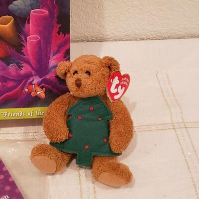Lot 910: NEW Puzzle, 18" Doll Clothes Set, Lego LED Keychain and Ty Beanie Baby Ornament 
