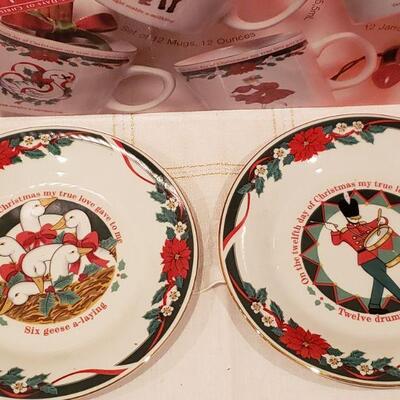 Lot 914: New/Old Stock 12 Days of Christmas Mugs and Dessert Plates- Complete Set of Both