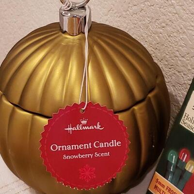 Lot 917: New Macy's Stockings, Polar Express Stocking Hanger, LED Wreath Lights and Candle