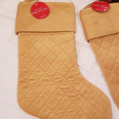 Lot 917: New Macy's Stockings, Polar Express Stocking Hanger, LED Wreath Lights and Candle