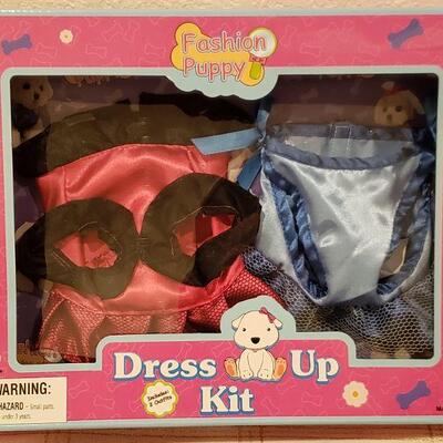 Lot 944: NEW Puppy and Puppy Dress Up, Grooming and Feeding Sets