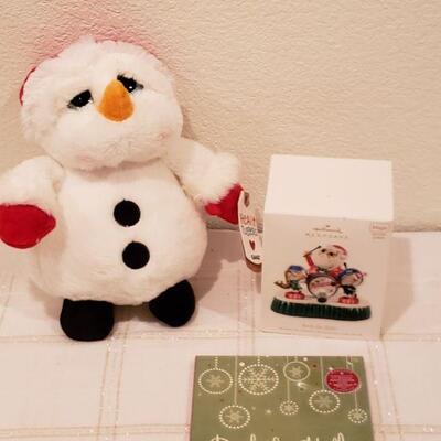 Lot 946:  NEW Hallmark Santa Magic Band Keepsake, Plushie Snowman and Holiday CD