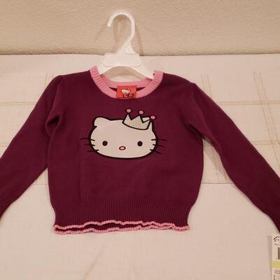 Lot 962: NEW HELLO KITTY Purple and Pink Sweater Size 4