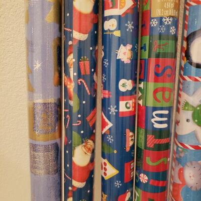 Lot 967: NEW (5) Rolls of Wrapping Paper (blues)  and Blue Fuzzy Wire Trim 