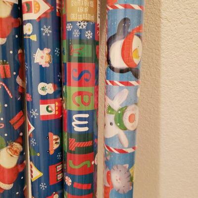 Lot 967: NEW (5) Rolls of Wrapping Paper (blues)  and Blue Fuzzy Wire Trim 