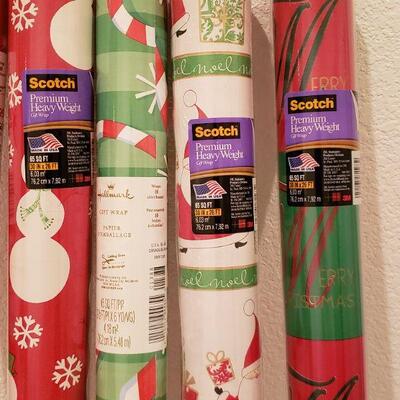 Lot 968: NEW (5) Rolls of Wrapping Paper (red & greens)