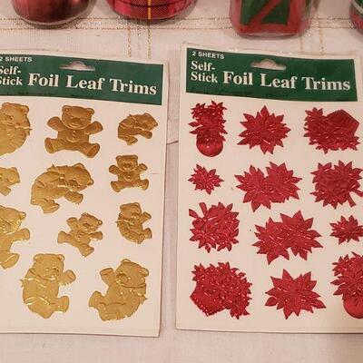 Lot 969: NEW (5) Rolls of Wrapping Paper (reds, greens and gold) and Stickers 