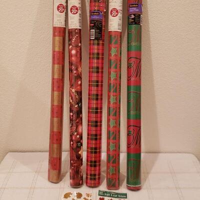 Lot 969: NEW (5) Rolls of Wrapping Paper (reds, greens and gold) and Stickers 