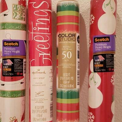 Lot 970: New (4) Rolls of Wrapping Paper and (2) Packages of Tissue Paper 