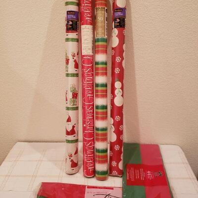 Lot 970: New (4) Rolls of Wrapping Paper and (2) Packages of Tissue Paper 